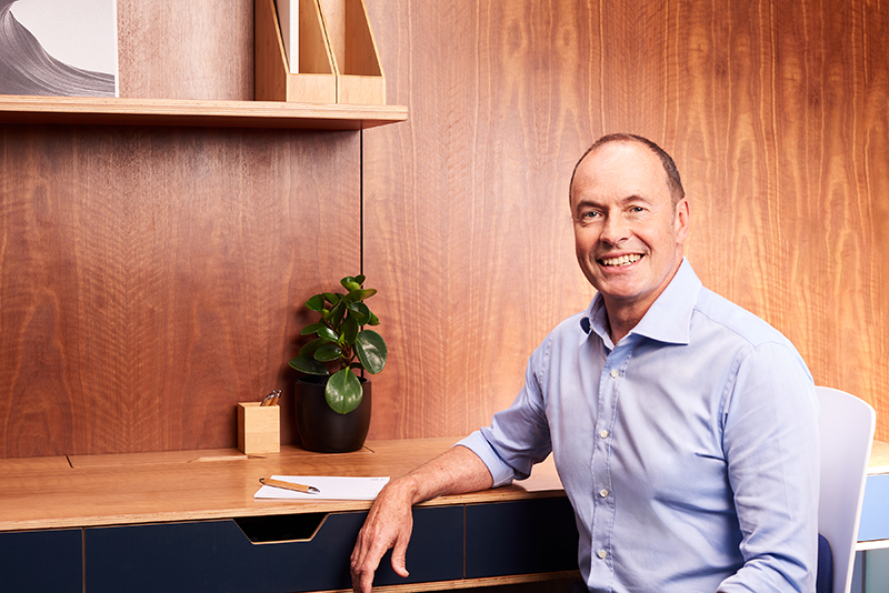 Dr Ross Applegarth Endodontist at desk